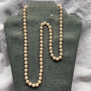 Monet Pearl Necklace. 29" Long. Individually knotted. Preowned. (582)